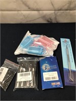 Qtip, White Strips , Curler pins, dental tool