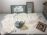 Table linen three framed prints and water pitcher