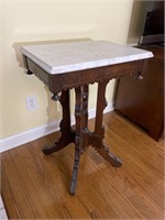 Antique stone-top accent table