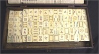 Boxed Chinese Mahjong set of 144 tiles.