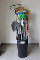 tub of yard and cleaning tools