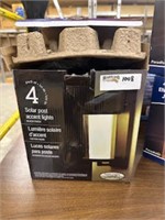 4 pack solar powered lights, in box, new