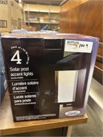 4 pack solar powered lights, in box, new