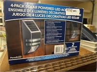 4 pack solar powered lights, pair, new