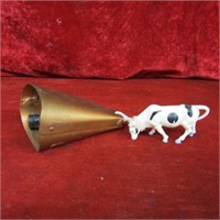 Vintage cow bell and Nylint plastic toy cow.