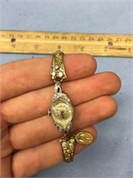 Ladies antique watch with gold nuggets and diamond