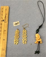 Pair of ivory oriental dangle earrings and a bone