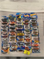 5 ROWS OF HOT WHEELS ON CARDS