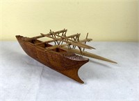 Intricate Carved Wooden Boat