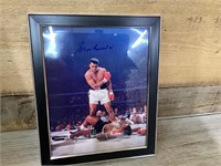 Muhammad Ali signed 8x10, auction not responsible