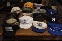 Variety of company logo ball cap hats