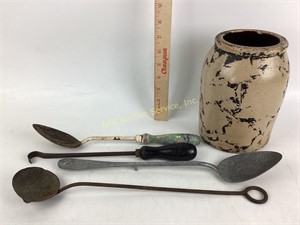 Stoneware crock.  Assorted metal spoons.