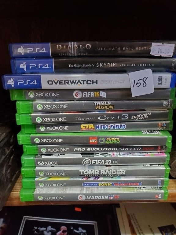 2 Stacks of XBOX ONE & PS4 Games