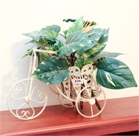 Painted metal bicycle plant stand, silk flowers