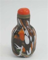 Chinese glass snuff bottle with coral lid