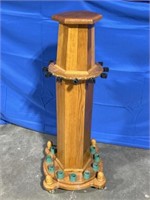 Wood fishing pole display stand on casters