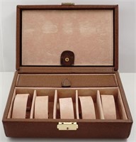 Brown leather watch case by Scully & Scully