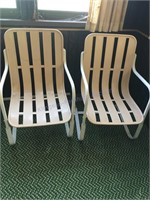 Two rocker lawn chairs
