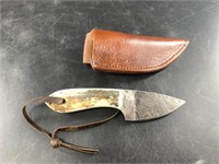 Short Damascus bladed skinning knife with ancient
