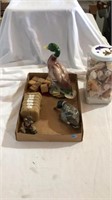 Seashells, duck statues, wooden blocks