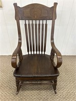 Antique pressed back rocking chair