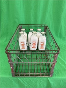 Milk crate with the vintage bottles