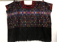 Homemade embroidered huipil top