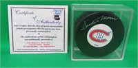 Dickie Moore AUTOGRAPHED Hockey Puck With COA
