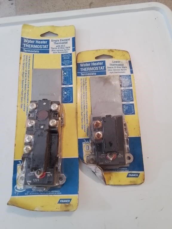Pair of new water heater thermostats