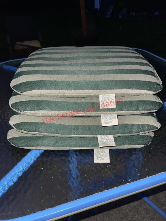 Four outdoor Chair Cushions (living room)