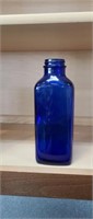 Vintage cobalt blue glass bottle