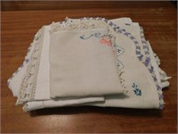 Embroidered doilies with lace edging - cut