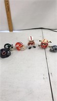 6 football helmets/Husker toys