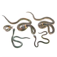 Five bronze European grass snakes