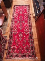 Oriental runner with red ground, blue, cream and