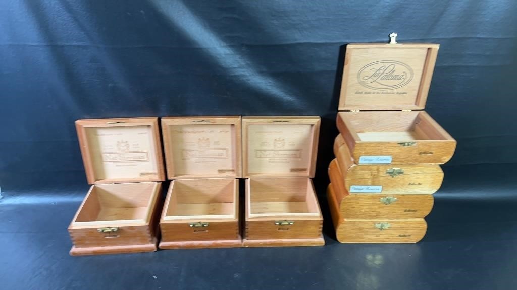 Three Nat Sherman wood cigar boxes and La Paloma