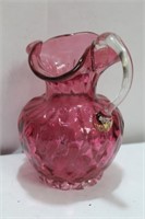 A Cranberry Glass Pitcher