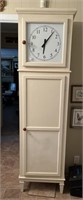 Cabinet w/clock. battery operated  80” T x 23.25 W