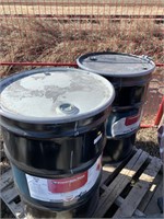 2 of 45 gallon steel barrels c/w lids