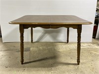 Wood dining table w/ two leaves