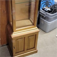 Gold color curio cabinet
