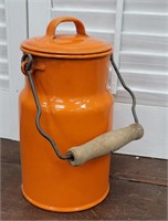 Orange enamelware cream can made in Poland