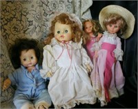 4 misc dolls with moveable eyes