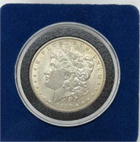 OF) 1900 Morgan dollar Condition AU