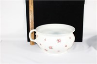 Antique chamber pot with flower detail
