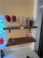 Lots of ruby red stemware, picture