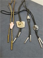 Four bolo ties