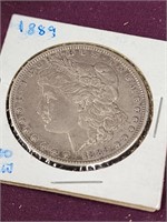 1889 Morgan silver dollar coin.  Look at the