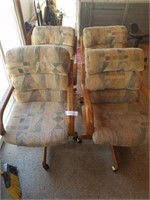 4 Rolling Chairs with Wood Trim