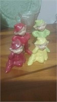 Group of four porcelain elf figures